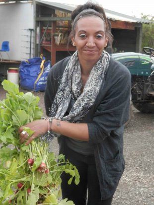 Volunteer with radish harvest