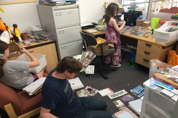 All hands on deck - the family working in the office to put crafting good supplies together