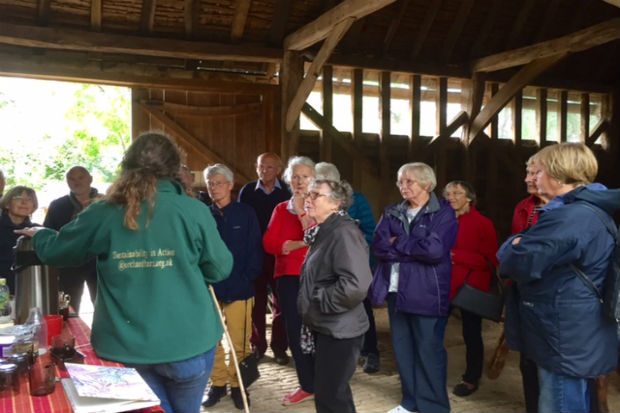 Visitors at a meeting with staff of Orchard Barn