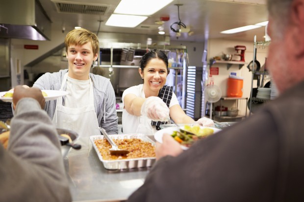 Volunteers feeding the homeless