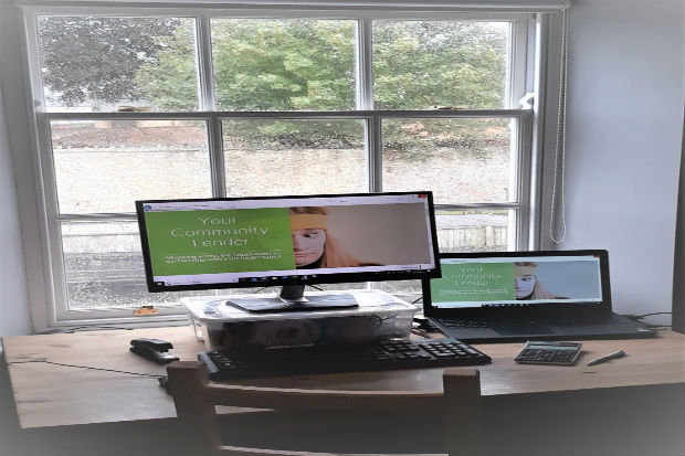 Computer and monitors on a desk 