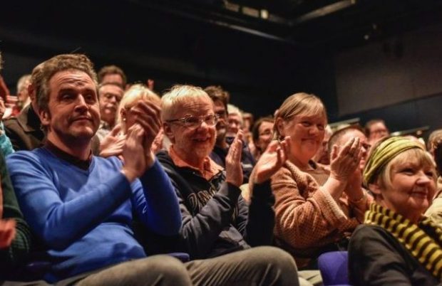 An audience enjoying the production