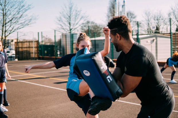 Daryl training with a child